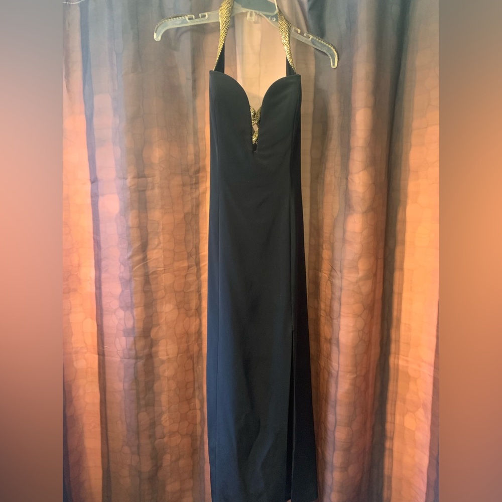 Size 4. Floor length dress with slit on thigh. Gently worn